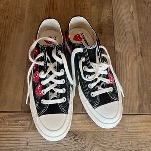 Brand new Converse X Comme des Garcons sneakers. Men’s 5/ Women’s 7